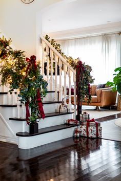 christmas decorations on the banisters and stairs