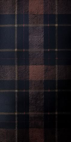 a black and brown checkered fabric textured with some red highlights on the side