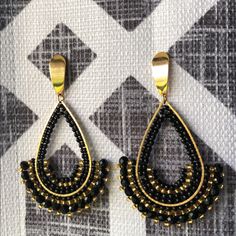 Gorgeous Handmade Tear Drop Earrings With Black And Gold Beads. New, Never Worn. Will Ship Asap. Also Available In White Elegant Colorful Beads Teardrop Dangle Earrings, Handmade Black Bohemian Teardrop Earrings, Elegant Colorful Beaded Dangle Teardrop Earrings, Black Bohemian Teardrop Dangle Earrings, Elegant Colorful Beaded Teardrop Dangle Earrings, Black Beaded Teardrop Earrings, Black Teardrop Jewelry With Colorful Beads, Gold Beaded Earrings With Black Beads For Party, Elegant Black Beaded Earrings With Gold Beads