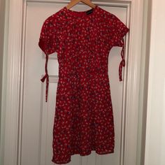 Very Cute, Light Weight Red Dress! Has A Hidden Zipper, Cute Ties On The Sleeves, And Slightly Flares Out At The Bottom. Never Worn! Bought This From Asos, So The Size 6 Fits Like A Small. I Usually Wear A 2-4 And It Fits Perfectly! Red Floral Print Mini Dress For Casual Occasions, Red Floral Print Midi Dress For Daywear, Red Floral Midi Dress For Daywear, Red Short Sleeve Midi Dress For Daywear, Red Mini Dress For Daywear, Red Mini Dress For Spring Daywear, Red Fitted Mini Dress For Daywear, Casual Red Mini Dress For Daywear, Fitted Red Mini Dress For Daywear