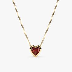 Ashly Follow your heart, and it will lead you to our gold necklaces. This captivating necklace features a beautiful heart-shaped garnet gemstone, meticulously set in a classic bezel setting and suspended from a delicate 14k gold chain (available in yellow, white, or rose gold). The rich red color of the garnet adds a touch of elegance and symbolism to any outfit. - Handmade - Solid Gold- Natural Garnet- Heart Size: 7.5 mm- Total Garnet Carat Weight: 0.55 ctw All pieces come beautifully boxed in Garnet Heart Necklace, Memory Ring, Red Heart Necklace, Garnet Heart, Bezel Necklace, Garnet Necklace, Garnet Jewelry, Initial Jewelry, Beautiful Heart