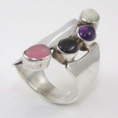 Native American Charlie O Sterling Silver Large Gemstone Statement Ring Size 10 Us Ring Size 10 Uk Ring Size T1/2 Gram Weight 14.6 Size Of Ring Face (North To South By East To West) In Millimeters 41 X 11 Main Stone Type Multi Gemstone Length And Width Of Main Stone In Millimeters 8 X 6 Hallmarked Yes Tested Yes Condition Issues Other Than Ordinary And Normal Use Marks N/A Inventory Number Sfa-230-Aa01 Please Contact Us With Any Questions. We Love To Hear From Shoppers. Size 10 Rings, Womens Jewelry Rings, Gemstone Ring, Statement Ring, Statement Rings, Native American, Gemstone Rings, Jewelry Rings, Ring Size