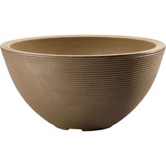 a brown bowl sitting on top of a white table