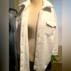 Full Length Sherpa Coat Shacket Style Brans New Never Worn! Women’s Size Small Very Warm And Plush White Oversized Outerwear With Lapel Collar, White Shacket With Lapel Collar And Pockets, White Long Sleeve Shacket For Winter, Oversized White Buttoned Outerwear, Oversized White Outerwear With Buttons, Casual Winter White Outerwear With Lapel Collar, White Button-up Outerwear With Pockets, White Collared Shacket With Pockets, White Outerwear With Lapel Collar And Button Closure