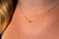 Literally the most elegant, beautiful, dainty citrine birthstone necklace you will ever wear. This tiny (and I mean TINY for that delicate feminine aesthetic) citrine stone will set you apart like no other gemstone. What a stunningly beautiful, impressive gift to let that special someone know just how important they are to you. DETAILS Your new made to order tiny citrine necklace will consist of a dainty citrine bead measuring 4mm across, hand carved with a delicate .8mm 925 silver box chain str Amber Birthstone Dainty Necklace, Everyday Amber Jewelry Birthstone, Everyday Amber Birthstone Jewelry, Dainty Faceted Necklaces, Dainty Amber Sterling Silver Jewelry, Gold Faceted Birthstone Necklace, Dainty Citrine Jewelry For Weddings, Dainty Yellow Gemstone Jewelry, Dainty Citrine Wedding Jewelry