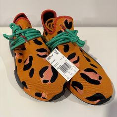 Brand New With Tagsmen’s Adidas Nmd Hu Animal Print Sneakers. Size 10.5. Sock Like Fabric With Yellow And Orange Colors. Features Boost Midsole. Comfortable Orange Sneakers For Streetwear, Adidas Casual Slip-on Custom Sneakers, Comfortable Non-slip Adidas Sneakers, Casual Orange Custom Sneakers, Adidas Custom Casual Running Sneakers, Adidas Casual Custom Sneakers For Running, Adidas Casual Non-slip Sneakers, Casual Adidas Non-slip Sneakers, Casual Non-slip Adidas Sneakers