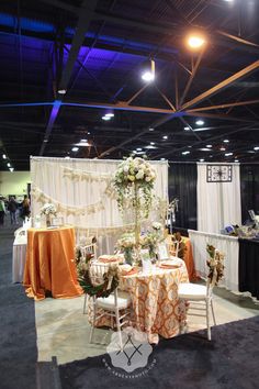 an event with tables and chairs set up