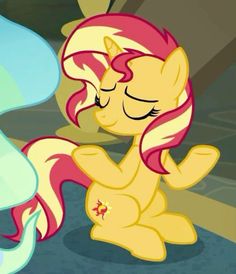 the pinkie pony is sitting down with its eyes closed and her hair blowing back