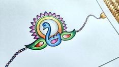 a drawing of a peacock with the letter e on it