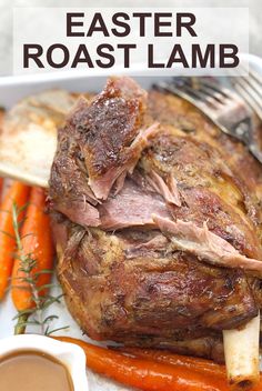 slow roasted lamb with carrots and rosemary garnish