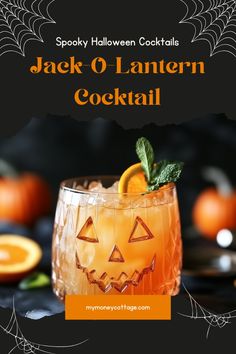 jack o lantern cocktail in a glass with an orange slice