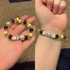 two children's bracelets with letters on them