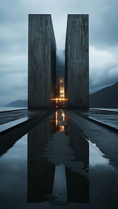 the reflection of two concrete structures in water