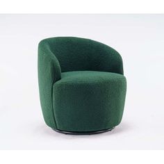 a green chair sitting on top of a white floor