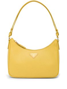 sunflower yellow Saffiano leather enamel triangle logo logo tag tonal hardware top zip fastening adjustable shoulder strap main compartment internal logo plaque logo-jacquard lining This piece comes complete with a protective dust bag. Classic Saffiano Leather Bag With Logo Hardware, Rectangular Saffiano Leather Bag With Gold-tone Logo Plaque, Luxury Yellow Shoulder Bag With Zipper Closure, Luxury Yellow Bag With Zipper Closure, Luxury Yellow Bags With Zipper Closure, Yellow Crossbody Bag, Yellow Prada Bag, Saffiano Leather Mini Bag, Prada Mini Bag