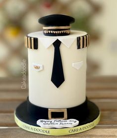 a cake made to look like a sailor's hat with a tie on top