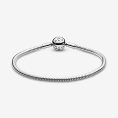 Start your very own Pandora story with this sleek snake chain bracelet in polished sterling silver. The perfect canvas for your creativity, this hand-finished bracelet can be styled in countless ways. Fill it with your desired charms and clips, wear it on its own for a simple, understated look, or stack it with contrasting bracelets for a fun play on textures. Only silicone-lined safety chain clips will fit this Moments bracelet. - Pandora Moments Snake Chain Bracelet - Sterling silver - Sz. 7.1 Adjustable Bracelet With Sterling Silver Clasp And Snake Chain, Adjustable Snake Chain Bracelet With Sterling Silver Clasp, Modern Silver Snake Chain Bracelet, Elegant Silver Charm Bracelet With Snake Chain, Classic Sterling Silver Snake Chain Bracelet, Elegant Silver Snake Chain Charm Bracelet, Sterling Silver Snake Chain Bracelet, Silver Snake Chain Bracelet For Everyday, Pandora Story