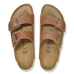 An icon of timeless design and legendary comfort, the Arizona sandal has been defining style since 1973. Oiled leather only looks better with wear, giving each pair a unique, well-traveled patina. With an original contoured footbed for support, it'll feel uniquely yours wherever you take it. Contoured cork-latex footbed creates custom support with wear Oiled leather upper gives each pair a unique finish Suede footbed lining helps keep you comfortable EVA sole is flexible & lightweight Two straps Van Accessories, Mens Boots Casual, Swim Pants, Denim Sweater, Zermatt, Shoe Boot Sandals, Eva Sole, Reykjavik, Birkenstock Arizona