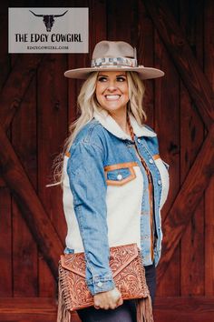 We are blown away by the comfy fit and details in this jacket! If you’re looking for the perfect sherpa denim jacket, you have found it! rodeo fashion western style rodeo fashion womens rodeo fashion shirts & tops cowgirl style cowgirl style outfits |theedgycowgirl| Sherpa Denim Jacket, Country Fashion Women, Rodeo Fashion