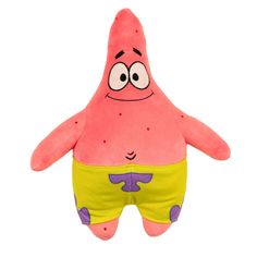 a pink and yellow stuffed animal with eyes on it's back, sitting in front of a white background