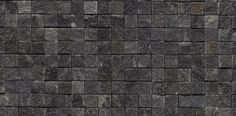 an image of a black stone wall texture