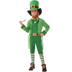 a little boy dressed in a green lepreti costume holding a pipe and pointing at something