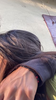 a close up of a person with long hair