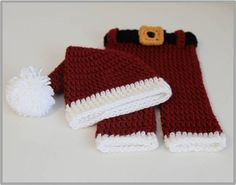 a crocheted hat and scarf with a pom - pom