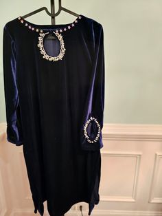 Beautiful blue Velvet handwork pearl dress embroidered dress with fine beads and pearls to embellish the dress. For party wear and special occasions. Comes along with customized bottom if requested Hand Embellished Semi-stitched Kurta For Party, Party Kurta Hand Embellished Semi-stitched, Hand Embellished Semi-stitched Party Dress, Elegant Semi-stitched Embellished Embroidered Dress, Hand Embellished Embroidered Dress For Eid Festival, Hand Embellished Straight Kurta Dress For Wedding, Unstitched Embellished Dress For Diwali, Diwali Unstitched Hand Embellished Dress, Embellished Semi-stitched Embroidered Dress For Party