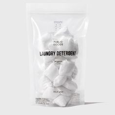 a bag of laundry deterant sitting on top of a white table