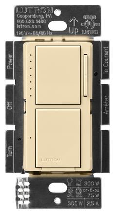 a light switch with two switches on each side and one in the middle, facing forward