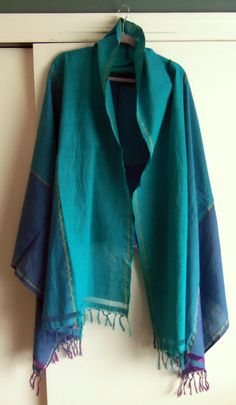 The color on this shawl or wrap is beautiful.  It would be stunning with a dark blue or cream dress or outfit.  It was brought back when a family member traveled to India and Bali years ago. Summer Shawl, Shoulder Wrap, Blue Pottery, Dark Teal, Cream Dress, Shawls And Wraps, Shades Of Blue, A Family, Etsy Vintage