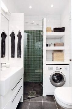 a washer and dryer in a small room