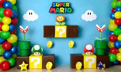 a super mario birthday party with balloons and decorations