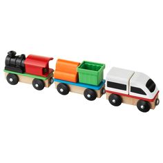 three wooden toy trucks with different colors and designs on them, each carrying a smaller container