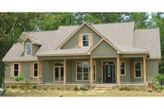 a large house with lots of windows in the front