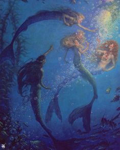 three mermaids swimming in the ocean with bubbles on their heads and tails, surrounded by fish