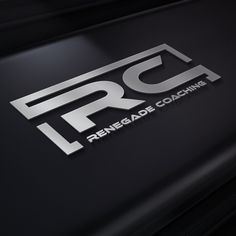 the logo on the side of a black car that reads, frc renode coaching