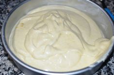 a metal pan filled with batter on top of a counter