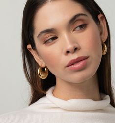 Meet these gorgeous hoop earrings. They're not just lightweight, tarnish-resistant, and waterproof, but also super chic! The textured design gives them a vintage feel that's always in style. Whether you're jazzing up for a night out or just adding a touch of class to your everyday look, these earrings are the perfect size to make a statement Textured Hoop Earrings For Everyday Wear, Everyday Textured Hoop Earrings, Everyday Small Hoop Textured Earrings, Chic Pierced Hoop Earrings, Chic Textured Metal Earrings, Modern Textured Small Hoop Earrings, Skin Allergies, Textured Design, Gold Piece