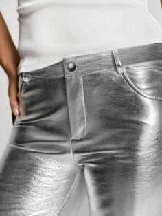 Explore our Boy pants in Chrome – a bold fusion of style and sustainability. Crafted from luxurious vegan leather in a striking chrome hue, these pants are a testament to modern fashion. Unleash your individuality with this statement piece, meticulously designed for both men and women. Elevate your look with adjustable lengths, ensuring a personalized fit that reflects your unique sense of style. Step into the future of fashion with our Boy pants in Chrome – where innovation meets timeless elega Miranda Priestly, Future Of Fashion, Boy Cuts, Slow Fashion Brands, Avant Garde Fashion, Into The Future, Elevate Your Look, Modern Fashion, Slow Fashion