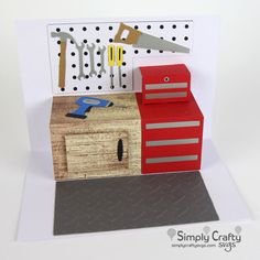 a handmade card with tools on it and a tool box next to it that says happy father's day