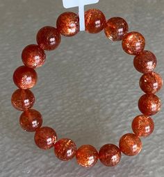 Material:  ...Golden sunstone beads  size :  10mm   quantity: one strand  6mm approx 29 pcs one strands 7mm approx25 pcs one strands 8mm approx 22 pcs one strands 9mm approx 21pcs one strands 10mm approx 19 pcs one strands 11mm approx 18pcs one strands 12mm approx 16 pcs one strands 13mm approx 16 pcs one strands 14mm approx 15 pcs one strands 15mm approx 14pcs one strands 16mm approx 14 pcs one strands 17mm approx 13pcs one strands 18mm approx 13pcs one strands 19mm approx 12pcs one strands 20m Amber Crystal Bracelet With 8mm Beads, Amber Crystal Bracelet With 8mm Round Beads, Women Bracelet, Christmas Deals, Beads Bracelet, Bracelet Jewelry, Wedding Basket, Colour Tone, Natural Crystals