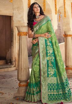 Green banarasi silk festival wear saree 10104  Desc:  Style : Banarasi Sarees Color : Green Fabric : Banarasi Silk Wash Care : Dry clean Sleeve Style : Half Sleeve Long Sleeves : Done only in Custom Stitch Sleeves Lining : Done only in Custom Stitch Bust Size : 32 to 42 Inches Occasion : Ceremonial   Baby Shower   Pongal   Engagement   Festival   Christmas   Diwali   Sangeet. With Express Free Shipping and Custom Stitching, Buy Indian Wedding Party Wear Saree Green banarasi silk festival wear sa Saree For Diwali, Embroidery Blouse Saree, Indian Wedding Party, Saree Green, Saree Bollywood, Wedding Sarees, Wedding Saree Indian, Diwali Festival, Saree Models