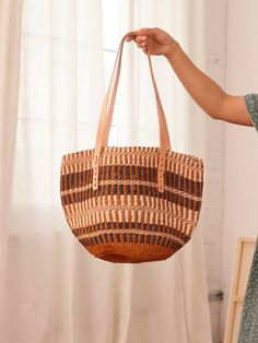 Jenna Bee’s Brown Stripes Sisal Bag blends Kenyan craftsmanship with a vintage-inspired Californian touch. Handwoven from sustainable sisal fiber by skilled artisans in Kenya and finished with vegetable-tanned leather in Southern California, this timeless bag is the perfect everyday accessory. Moon Silhouette, Timeless Bags, Vintage California, California Style, Everyday Accessories, Basket Bag, Everyday Bag, Vegetable Tanned Leather, Southern California