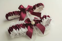 Wine Bridal Garter Set, Wedding Garter Set, Burgundy Garters, Red Garter Belt, Wine Bridal Garters, Lace Wedding Garters, Keepsake Garter Beautiful wedding set! Made of satin, lace, ribbons and brooch. Please choose your primary color in a drop down menu above the quantity. Also Please choose your accessories in a drop down menu. If you meed other combination of accessories - send me a message ;) I'll respond you very quickly. Please measure your size for the keepsake garter and do not take off Wedding Wine Basket, Gold Flower Girl Basket, Red Garter Belt, Gold And Burgundy Wedding, Ring Pillow Lace, Red And White Weddings, Wedding Garter Lace, Bridal Garters Set, Wedding Pillow