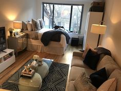 a living room filled with furniture and a flat screen tv