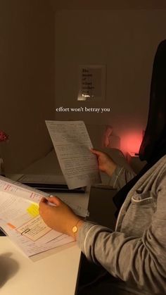 a woman sitting at a desk with papers in front of her and the caption that reads, there won't be any you