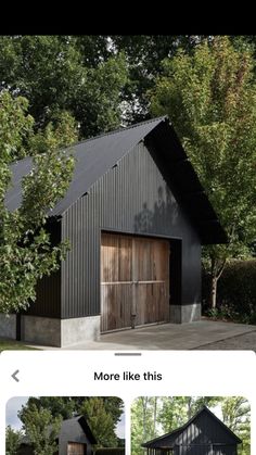 an image of a black house with two garages on the front and one in the back