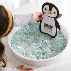 Feed The Penguin Game, Feed The Penguin Preschool, Penguin Sensory Activity, Penguins Activities For Preschoolers, Penguin Toddler Activities, Penguin Sensory Bin, Penguin Activities For Kids, Penguin Activities For Toddlers, Penguin Activities For Preschool